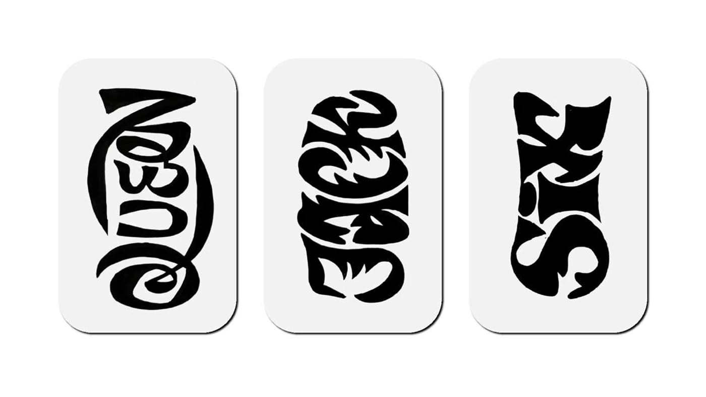 The image presents three rectangular white cards, each featuring a black stylized design. The first card displays the word "Queen" in a cursive font. The second card features the word "Jack" in a stylized font. The third card displays the word "Sex" in a stylized font. The design elements on each card are black and cre