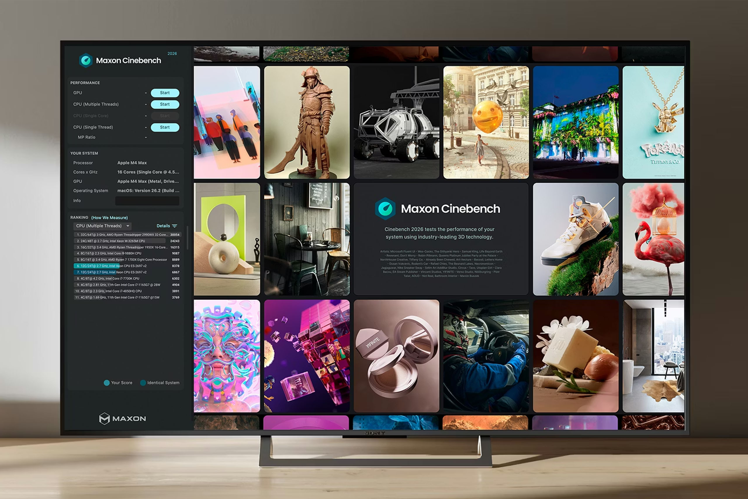 The image shows a large flat-screen television displaying the website of Maxon Cinebench, a design and development company. The website features a clean, modern design with a black background and white text. The website is divided into a grid of nine sections, each showcasing a different image. The images are arranged