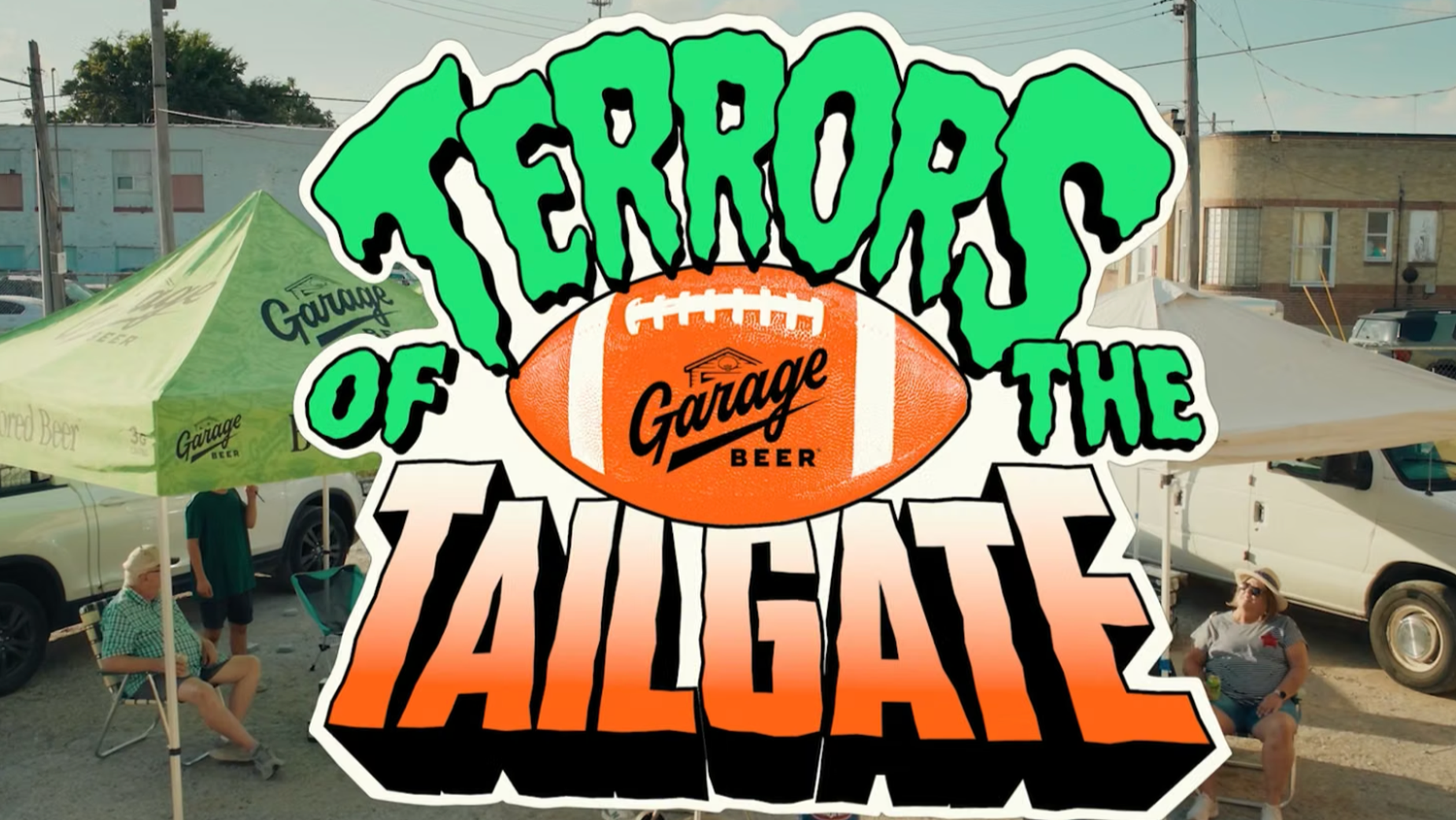The image shows a vibrant scene from a tailgate party. The central focus is a large, cartoonish green and orange football with the words "Garage Beer" written on it. The football is positioned in front of a white tent with a green and white "Garage Beer" logo. The tent is set up in a parking lot, with a white pickup tr